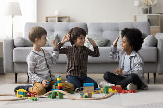 Kids Playing Adobe Stock 587974945